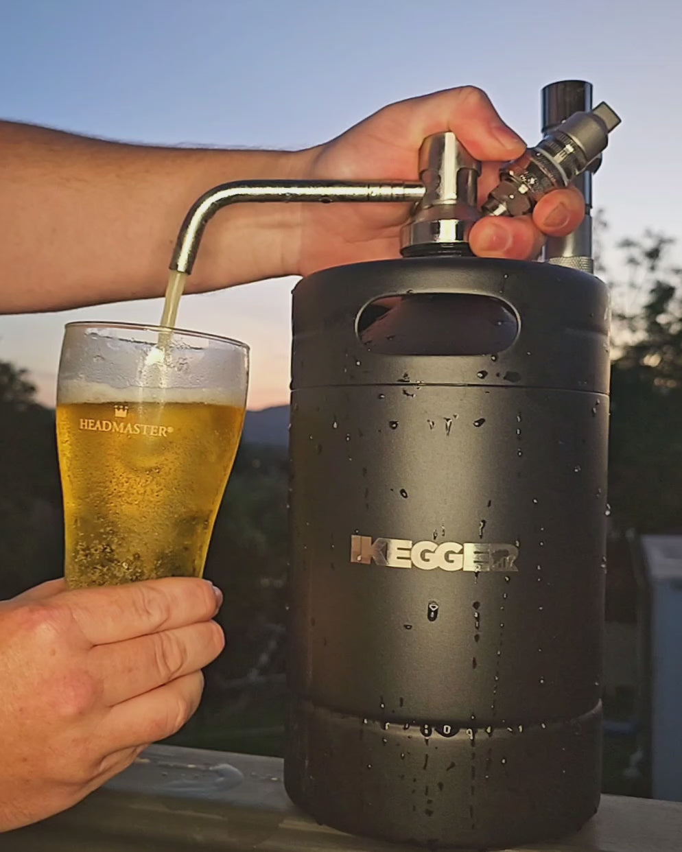 beer keg pour, the perfect way to end the day. slomo pour at sunset